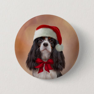 Cavalier King Charles Spaniel in red hat of Santa Button