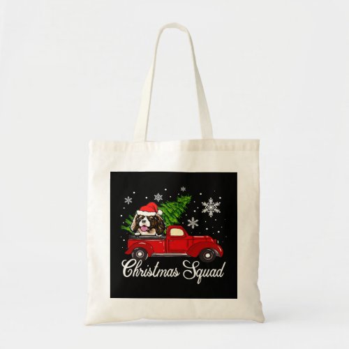 cavalier king charles spaniel riding red truck xma tote bag