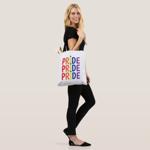 Celebrate pride month colorful rainbow text tote bag