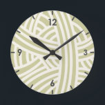 Celery Green Abstract Stylized Yarn Ball Round Clock<br><div class="desc">This abstract rendering of a yarn ball adds a touch of elegance to your craft room decor. Makes a great gift for a teacher, mother, sister or any other yarn lover in your life, including knitters, crocheters, dyers and spinners. Nice trendy pastel colors to coordinate with your decor. Dark gray...</div>