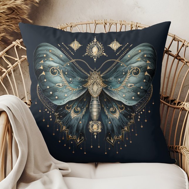 Celestial Blue Moth Witchmas Throw Pillow (Celestial Blue Moth Witchmas Throw Pillow in a boho rattan armchair.)