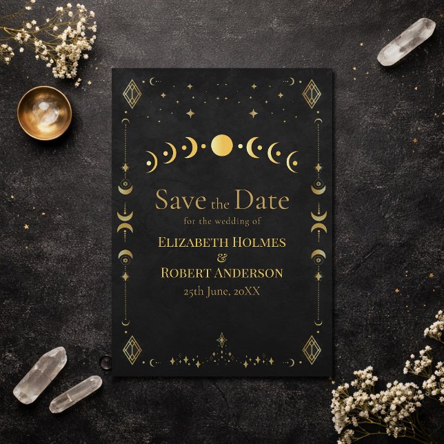 Celestial Gothic Black and Gold Save the Date Card (Celestial Gothic Black and Gold Save the Date Card on an elegant dark table with dry flowers)