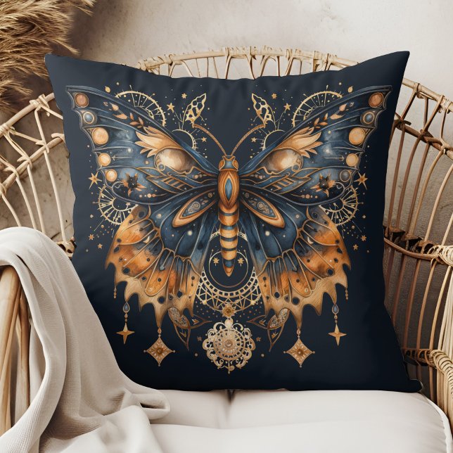 Celestial Moth – Golden Moon Throw Pillow (Celestial Moth – Golden Moon Throw Pillow in a boho rattan armchair.)