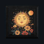 Celestial Sun Goddess with Blossoming Florals  Gift Box<br><div class="desc">Bask in the warmth and wonder of this stunning celestial design! This illustration captures a harmonious balance of the cosmos and nature, featuring a radiant sun with a serene, feminine face surrounded by vibrant golden rays. Delicate wildflowers in warm shades of crimson red, burnt orange, and golden yellow bloom around...</div>
