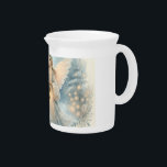 Celestial Winter Angel Lantern of Grace Beverage Pitcher<br><div class="desc">A serene celestial angel stands amid a quiet winter woodland, her soft wings glowing like dawn as she holds a warm lantern that gently lights the snow around her. Pale blues, creamy whites, and delicate golden sparks create an atmosphere of stillness and wonder, while intricate lace details on her gown...</div>