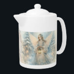 Celestial Winter Angel Lantern of Grace Teapot<br><div class="desc">A serene celestial angel stands amid a quiet winter woodland, her soft wings glowing like dawn as she holds a warm lantern that gently lights the snow around her. Pale blues, creamy whites, and delicate golden sparks create an atmosphere of stillness and wonder, while intricate lace details on her gown...</div>