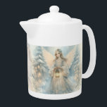 Celestial Winter Angel Lantern of Grace Teapot<br><div class="desc">A serene celestial angel stands amid a quiet winter woodland, her soft wings glowing like dawn as she holds a warm lantern that gently lights the snow around her. Pale blues, creamy whites, and delicate golden sparks create an atmosphere of stillness and wonder, while intricate lace details on her gown...</div>