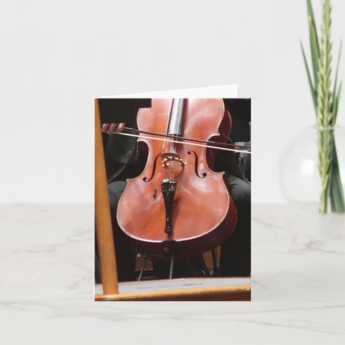 Cellist with symphony orchestra note card