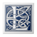 Celtic L Monogram Tile<br><div class="desc">A beautiful, decorative embossed celtic letter illuminated with gray dragon heads on a velvety dark blue background.</div>