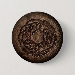 Celtic ornament embossed on leather button