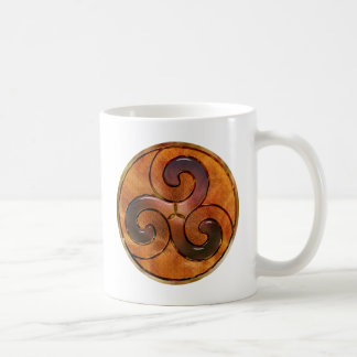 celtic triskele on gold coffee mug