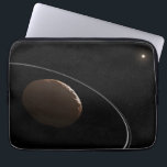 Centaur 1099 Chariklo And Its Rings. Laptop Sleeve<br><div class="desc">Artist's concept of what the Centaur Chariklo and its rings could look like. Chariklo is the largest of the known Centaur population, located more than 2 billion miles away between the orbit of Saturn and Uranus. Chariklo is only 160 miles across (250 kilometers or about 1/50th of Earth's diameter), and...</div>