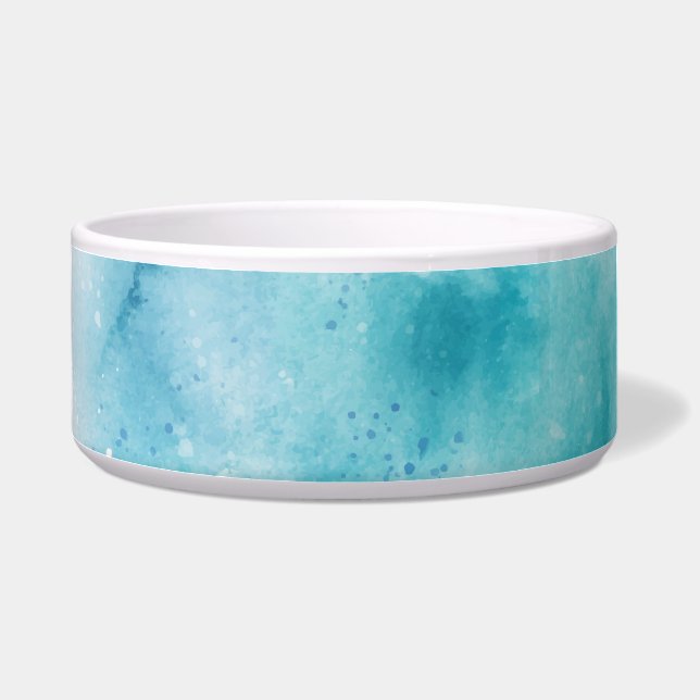 Ceramic pet bowl with a teal watercolor design.  (Left)