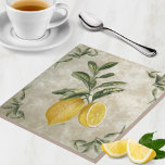 Ceramic Tile with Vintage Lemons<br><div class="desc">Beautiful Ripe Lemons on an elegant, rustic ceramic tile. A unique European etched branch of full green leaves with one whole lemon and one juicy lemon half on a neutral grey stone textured background. This is a great accent to any Italian or French Countryside inspired kitchen! lemon kitchen decor, country...</div>