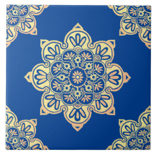 Ceramic tile, yellow medallion on deep blue ceramic tile