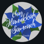 Chag Hanukkah Sameach - Blue Poinsettia Hanukkah Classic Round Sticker<br><div class="desc">Blue Poinsettia Hanukkah classic round sticker with grey background and Chag Hanukkah Sameach(Happy Hanukkah Holiday) saying,  below is your family name which you can personalize. A beautiful sticker to close Hanukkah greeting card envelopes or to seal Hanukkah gifts.</div>