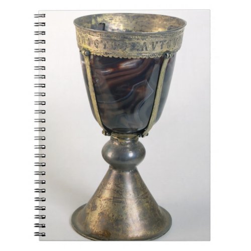 Chalice with jewels and an inscription on the bord notebook