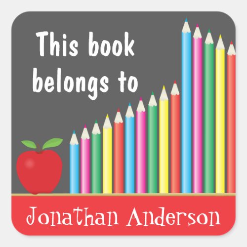 Chalkboard & Colored Pencils, This book belongs to Square Sticker - This book sticker features the customizable text: This book belongs to (students name).  The background is a chalkboard accented with colored pencils and a red apple.  These stickers are perfect to add the students name to his/her books.