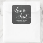Chalkboard Love is Sweet Wedding Favor Stickers<br><div class="desc">Trendy and cute wedding favor stickers with a pretty white typography text design that says Love is Sweet on a faux black chalkboard background. Personalized these cool labels with the name of the bride and groom and the date of the wedding.</div>