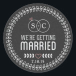 Chalkboard We're Getting Married Monogram Classic Round Sticker<br><div class="desc">Cute custom monogram save the date invitation envelope stickers. Featuring a cute laurel wreath design encompassing wedding rings with your custom initials. Customize with your own initials and wedding date.</div>