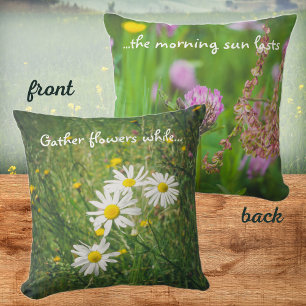 Chamomile and clover flowers on the green meadow throw pillow