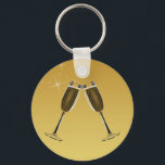 Champagne Glasses Celebration on Gold Keychain<br><div class="desc">A pair of elegant champagne glasses, flutes, touching for an elegant toast to your anniversary, graduation, engagement or wedding celebration, or the start of a new year. Formal or informal, it’s time to enjoy a little cocktail party bubbly. A pretty gold background completes the image for a high class party....</div>