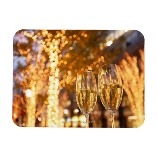 Champagne glasses toasting Christmas on city Magnet (Horizontal)