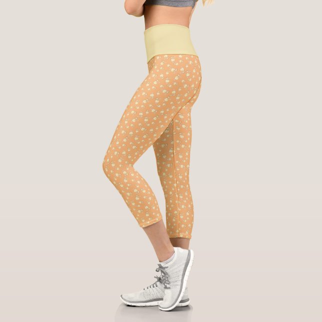 Champagne Heart Shaped Leaf Pattern Over Orange Capri Leggings (Left)
