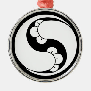 Changed shape two clove swirls metal ornament