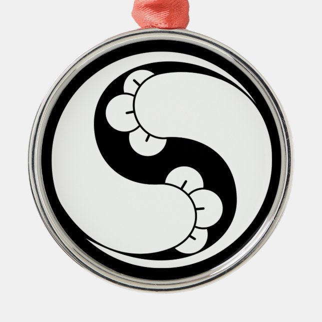 Changed shape two clove swirls metal ornament (Front)