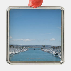 channel in harbor on a sunny day with blue sky metal ornament