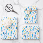 Chanukah Candles Burning White Blue Gold Wrapping Paper Sheets<br><div class="desc">Sometimes you just have a few items to wrap for Chanukah, and you don't want to buy a huge roll of Chanukah wrapping paper that will linger in your closet for years. This selection of three Chanukah wrapping paper sheets is perfect for wrapping a few gifts. Three separate sheets of...</div>