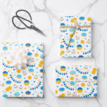 Chanukah Dreidels Doughnuts Gold Blue White Wrapping Paper Sheets<br><div class="desc">Sometimes you just have a few items to wrap for Chanukah, and you don't want to buy a huge roll of Chanukah wrapping paper that will linger in your closet for years. This selection of three Chanukah wrapping paper sheets is perfect for wrapping a few gifts. Three separate sheets of...</div>