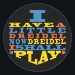 Chanukah/Hanukkah "Dreidel Play..." Stickers Round<br><div class="desc">Chanukah/Hanukkah "I Have a Little Dreidel... " Stickers Round. Have fun using these stickers as cake toppers, favor bag closures, or whatever rocks your festivities! The background can be changed by choosing from a large selection of colors. Thanks for stopping and shopping by! Your business is very much appreciated! Happy...</div>