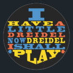 Chanukah/Hanukkah "Dreidel Play..." Stickers Round<br><div class="desc">Chanukah/Hanukkah "I Have a Little Dreidel... " Stickers Round. Have fun using these stickers as cake toppers, favor bag closures, or whatever rocks your festivities! The background can be changed by choosing from a large selection of colors. Thanks for stopping and shopping by! Your business is very much appreciated! Happy...</div>