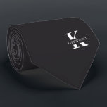 Charcoal Gray Elegant Monogram   Name | Two-Sided Neck Tie<br><div class="desc">An elegant necktie featuring a bold white monogram across a Charcoal Gray background. On top of this monogram sits your first or last name spelled out in all capitals. If you prefer a bolder look for the personal name inside of the large letter you can do the following: Use the...</div>