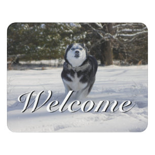 Charging Through Welcome Door Sign