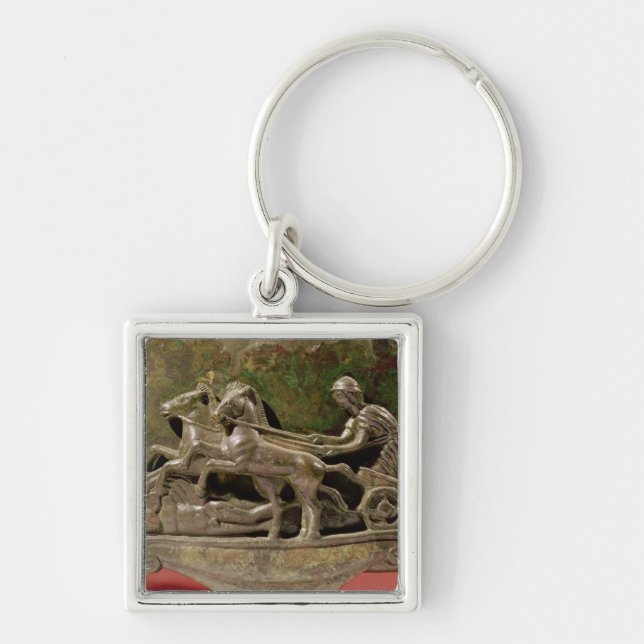 Charioteer in his chariot, detail from a cist keychain (Front)