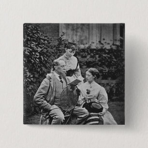 Charles Dickens with two of his daughters Button