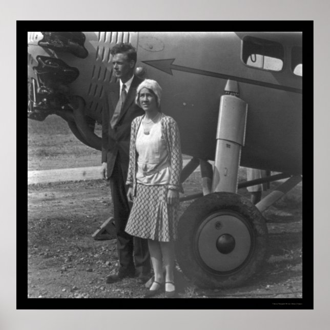 Charles Lindbergh and Wife next to Airplane 1929 Poster (Front)