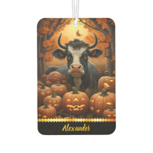 Charming cow among glowing pumpkins in autumn glow air freshener