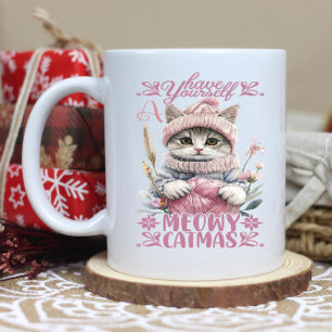 Charming winter cat knitting in soft pastel colors coffee mug