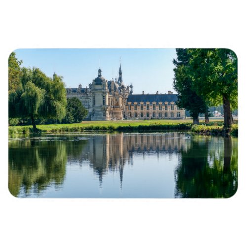 Chateau de Chantilly and reflection in a pond Magnet