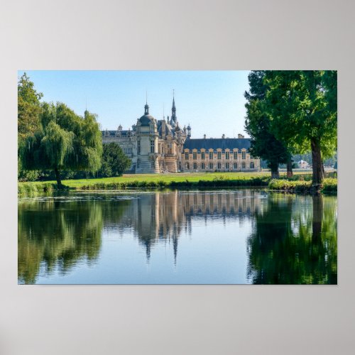 Chateau de Chantilly and reflection in a pond Poster