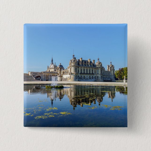 Chateau de Chantilly with reflection in a pond Button (Front)