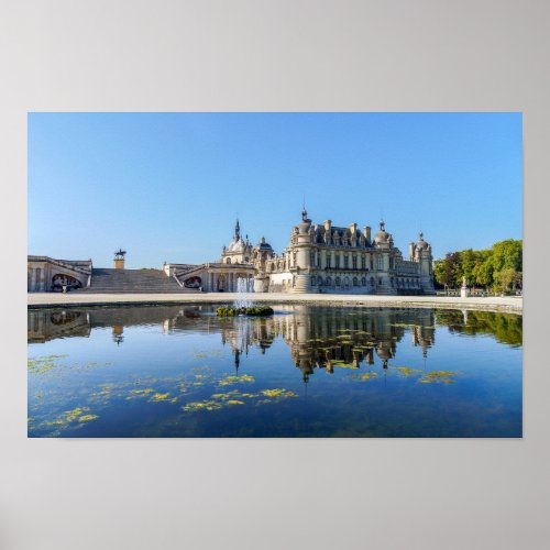 Chateau de Chantilly with reflection in a pond Poster