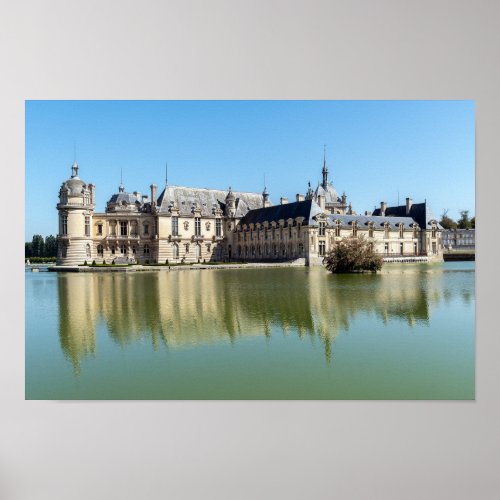 Chateau de Chantilly with reflection in the lake Poster