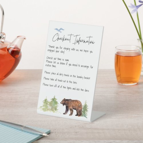 Check Out Information Guest House Rental Bear Pedestal Sign
