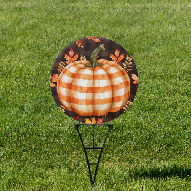 Checked pumpkin and falling leaves round yard sign (Insitu)