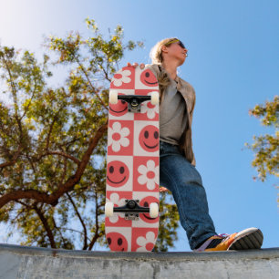 Checkered Flowers and Happy Faces Red Skateboard